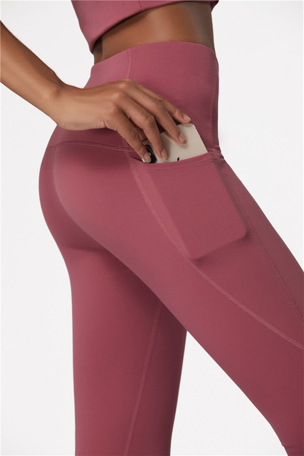 Leggings de cintura alta en el gimnasio deportivo Leggings de yoga para mujeres con bolsillos